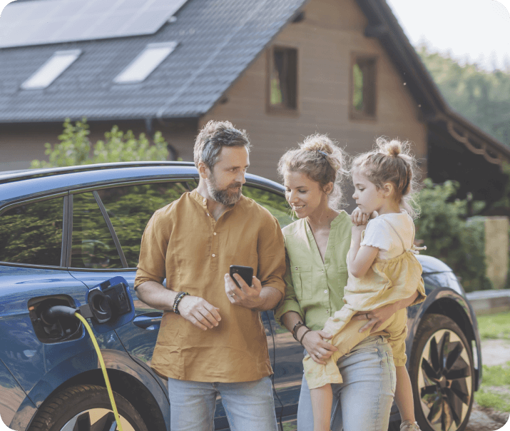 family charging their electric vehicle at home